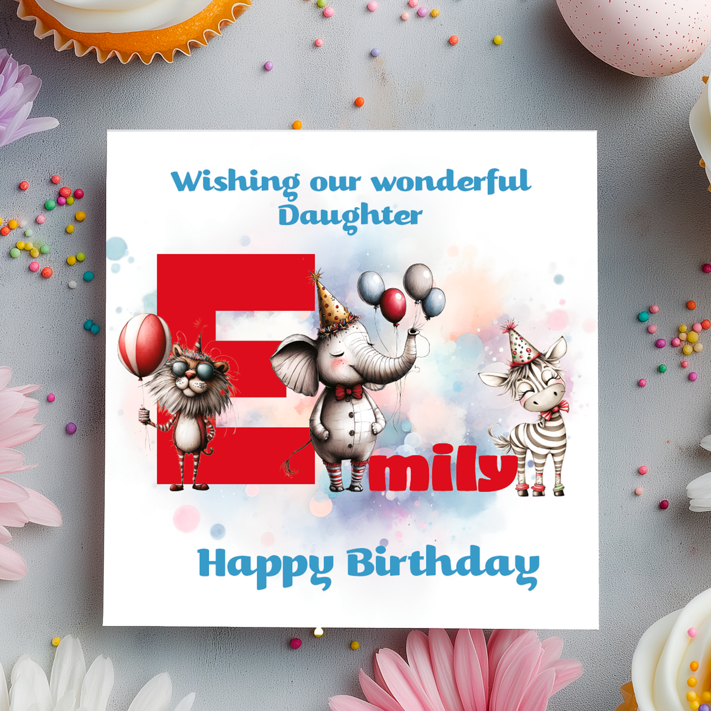 Birthday card with cartoon animals the letter E and personalized text on a decorative background.