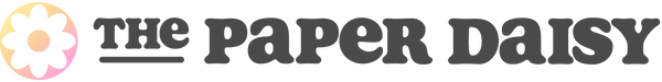 Logo of 'The Paper Daisy' with a daisy icon on a white background