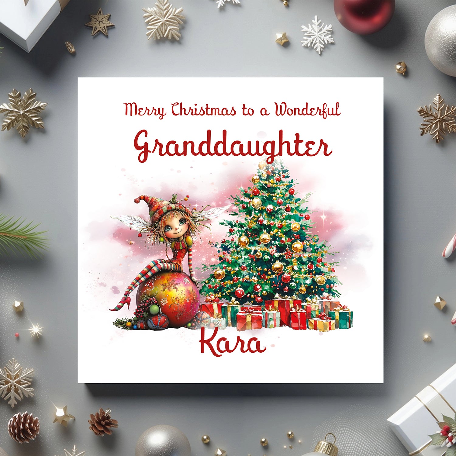 Christmas card for a granddaughter with a decorated tree and gift box on a festive background.