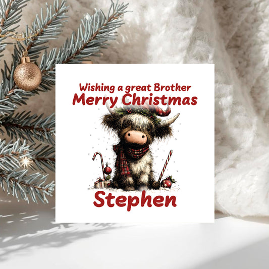 Christmas card with a highland cow illustration and text 'Wishing a great Brother Merry Christmas Stephen' on a white background.