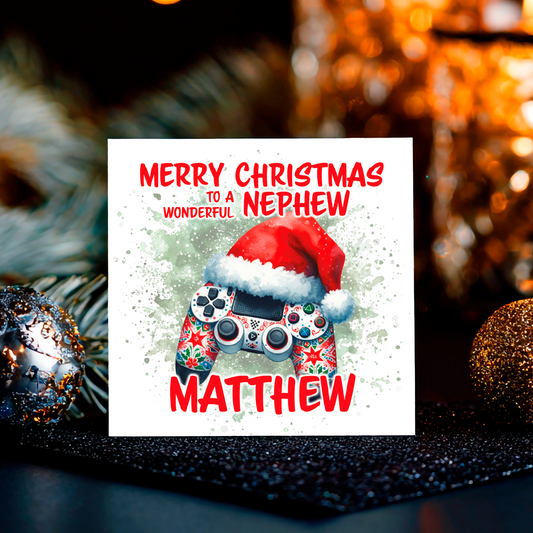 Christmas card with a controller wearing a Santa hat and text 'Merry Christmas to a wonderful nephew Matthew' on a decorative background.