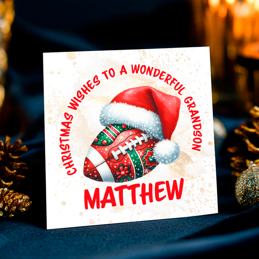 Christmas card with an American football and Santa hat, personalized for a grandson named Matthew, on a dark background.