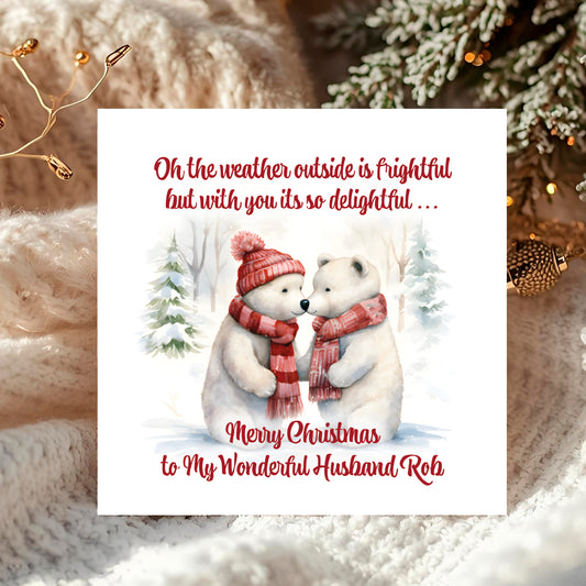 Christmas card with two polar bears wearing scarves and hats, surrounded by festive decorations.