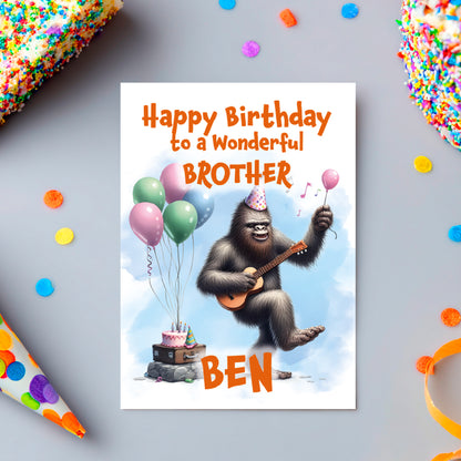 Birthday card with a gorilla playing guitar and balloons, text 'Happy Birthday to a Wonderful Brother Ben' on a colorful background.