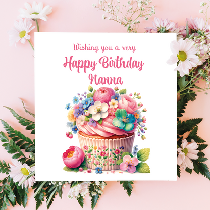 Birthday card with a cupcake and flowers on a pink floral background. Personalised for  name and relation 