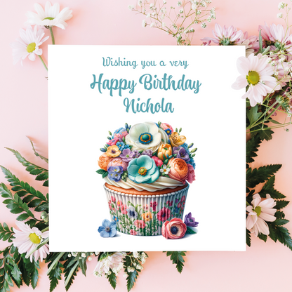 Birthday card with floral cupcake design and personalized name on a pink floral background Personalised for  name and relation 