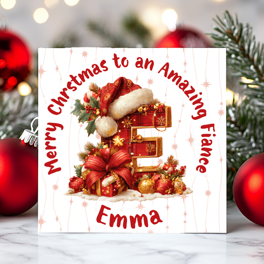 Christmas card with decorative text and festive elements on a blurred Christmas tree and ornament background.
