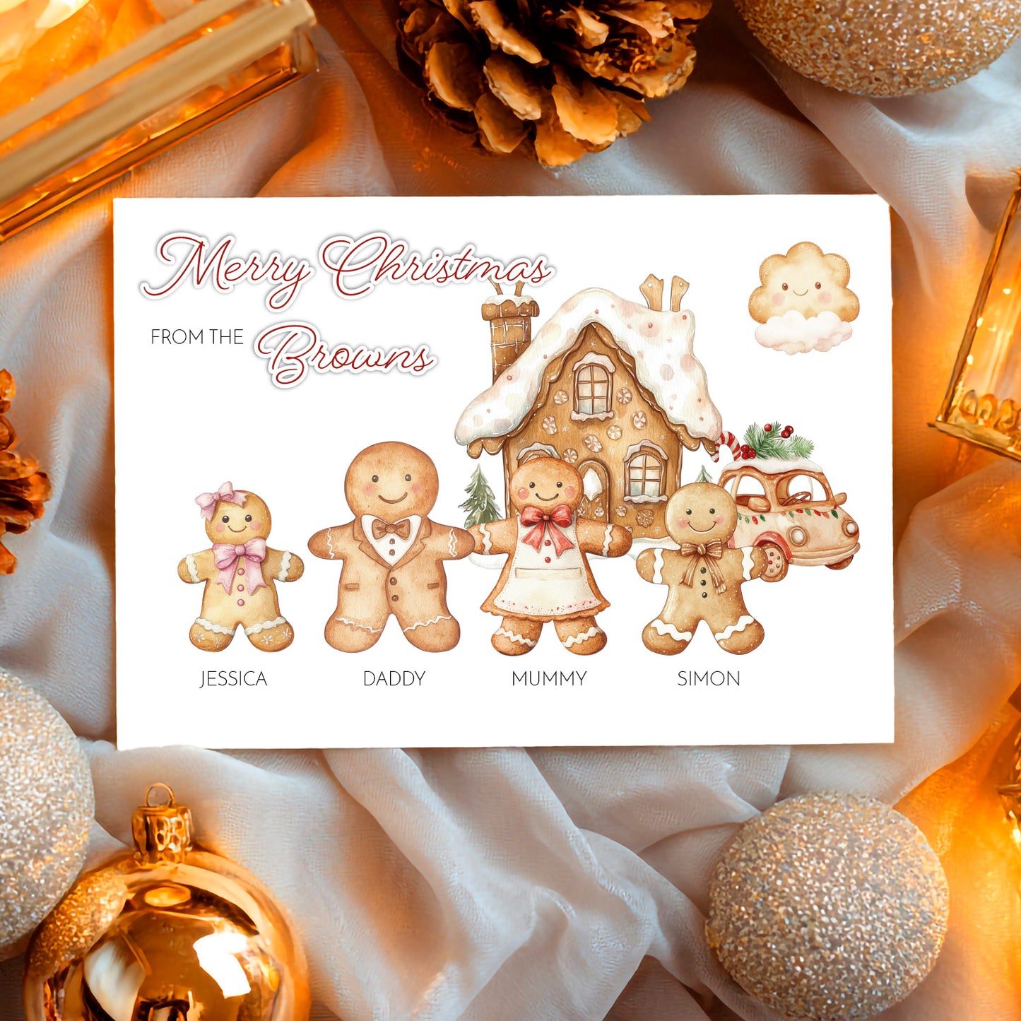 Christmas card with gingerbread family design surrounded by festive decorations.