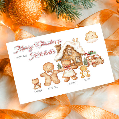 Personalized Christmas card with gingerbread family design on a decorative background.