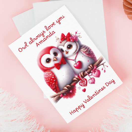 Valentine's Day card with two owls on a branch, hearts, and personalized text.