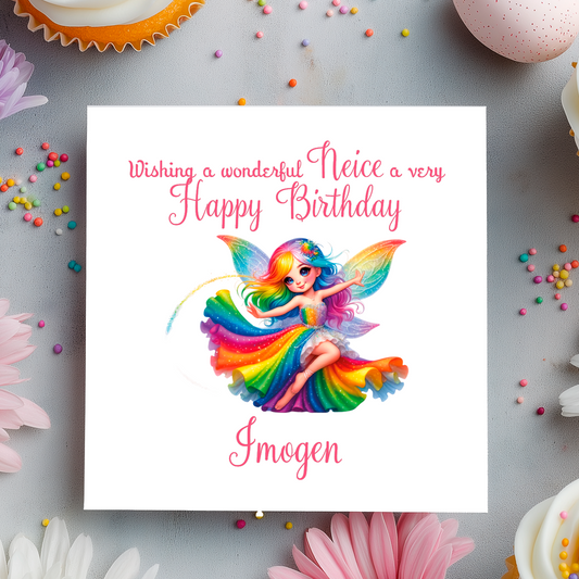 Birthday card with a colorful fairy illustration on a decorative background with flowers and candies.