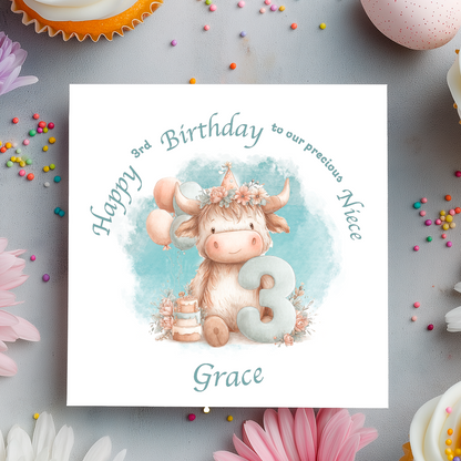 3rd Birthday card with a cartoon cow holding a number 3, surrounded by flowers and balloons on a light blue background. Personalised for name, age and relation.