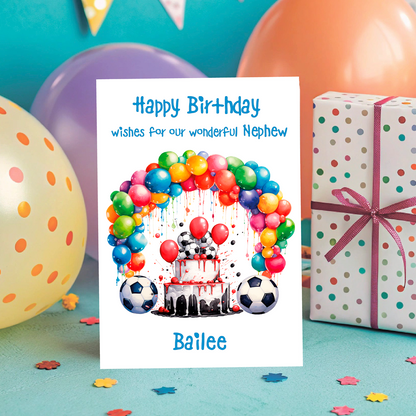 Birthday card with colorful balloons and cake design, surrounded by balloons and a gift box.