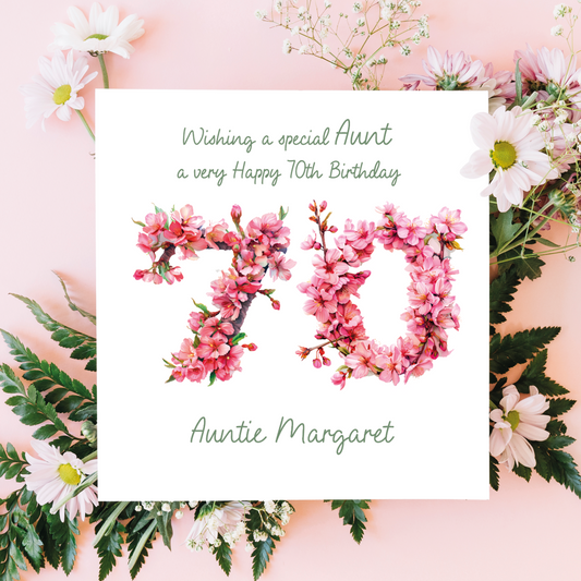 A Birthday Card with  number 70 decorated in cherry blossoms  with personalised birthday text for name, age and relation