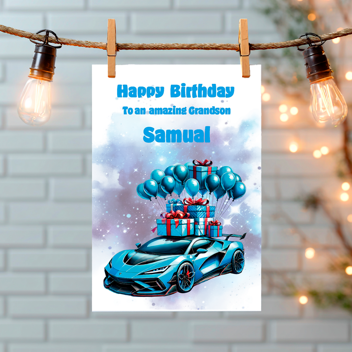 Birthday card with a blue car, balloons, and presents on a white background, hanging on a string with lights. Can be personalised to name, age and relation