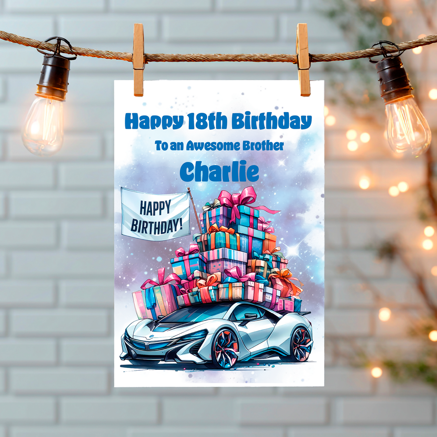 Birthday card with colorful gifts and a silver sports car, personalised ed for Charlie, on a light gray brick wall background. Can be personalised to name, age and relation
