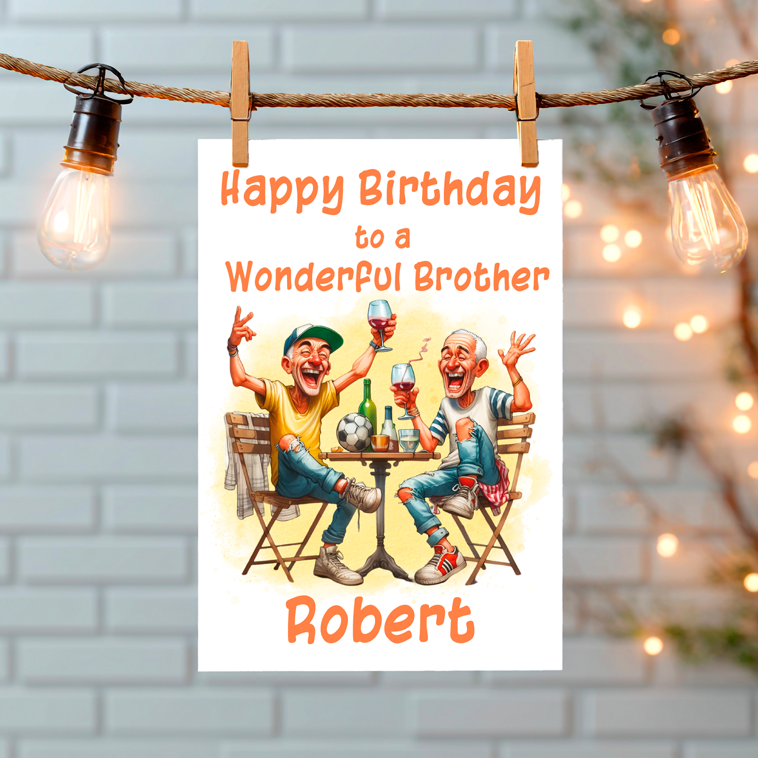 Birthday card for a brother with two caricatured characters at a table which has a football and drinks on it. , presented on a white walled background  on a string of lights. Can be personalised for name and relation.