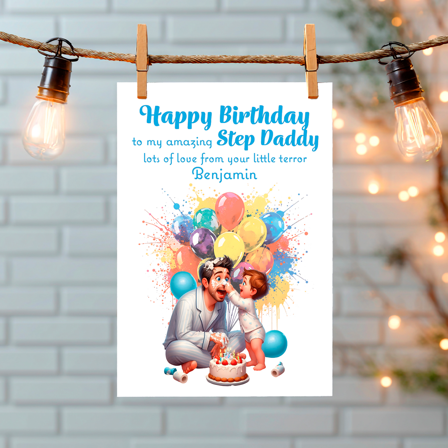 A Birthday card with an illustration of a young Boy  covering  his Dads face with  cake.  With a birthday cake and balloons behind them and a personalised message that can be personalised for Dad,Daddy,Step Daddy or Step Dad. Hanging from a string of lights on a white wall background 