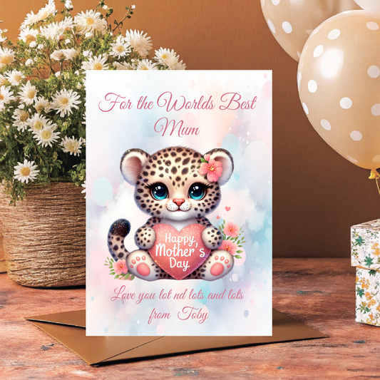 Mother's Day card with a leopard illustration and floral elements, placed on a wooden surface with balloons and flowers. Can be personalised with name of child/Children and for Mum,Mummy, Step Mum, Step Mummy, Grandma or Nanna