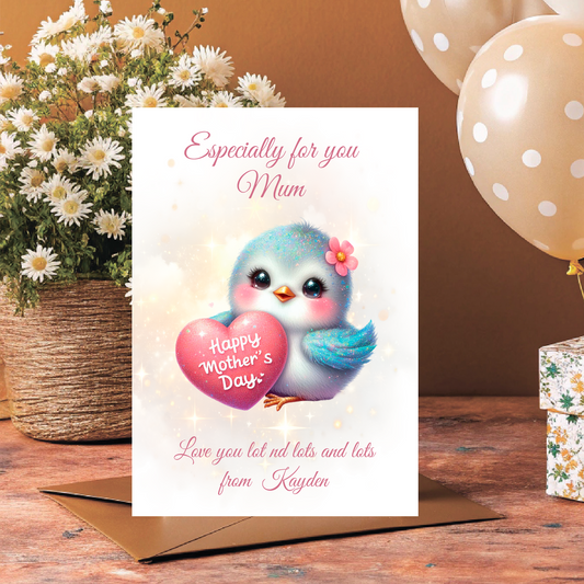 Mother's Day card with a bird holding a heart, flowers, balloons, and gift box on a wooden surface. Can be personalised with name of child/Children and for Mum,Mummy, Step Mum, Step Mummy, Grandma or Nanna