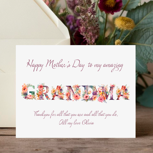 Greeting card for Mother's Day with floral text and a bouquet of flowers in the background.