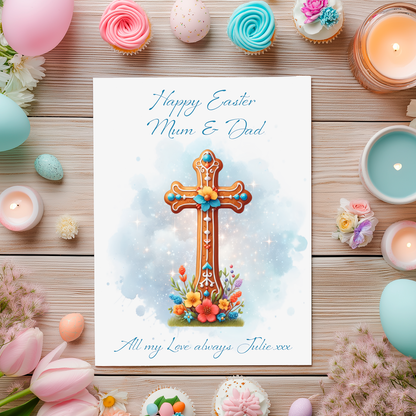 Easter card with cross design surrounded by Easter decorations on a wooden surface. Can be personalised with name and relation
