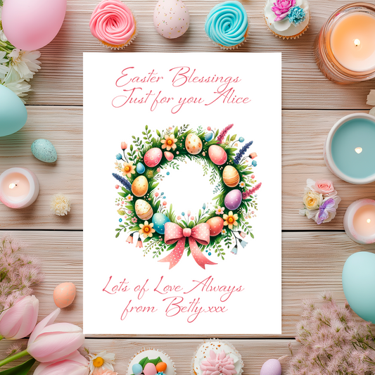 Easter-themed card with wreath design and personalized message on a wooden background with Easter decorations. Can be personalised for name and relation