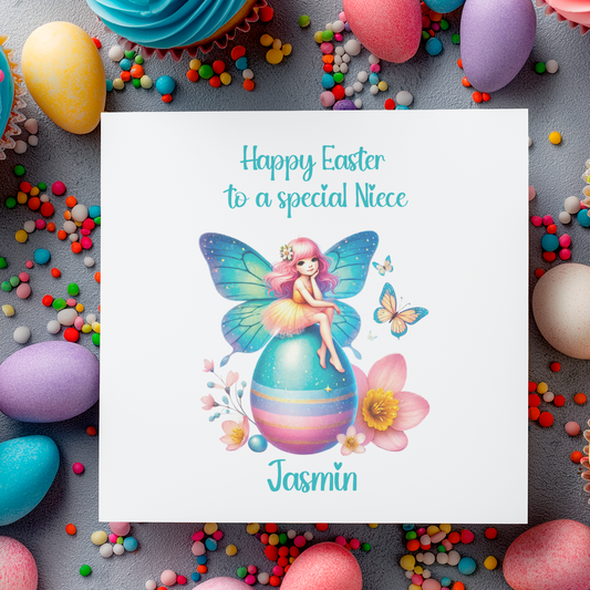 Easter Card with an illustration of a colourful fairy sat on an easter egg surrounded by flowers. With a message that can be personalised for name and relation