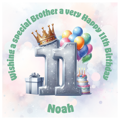 Happy 11th birthday card with number '11', crown, balloons, cake, and gift on a light background. Personalised with name age and relation.