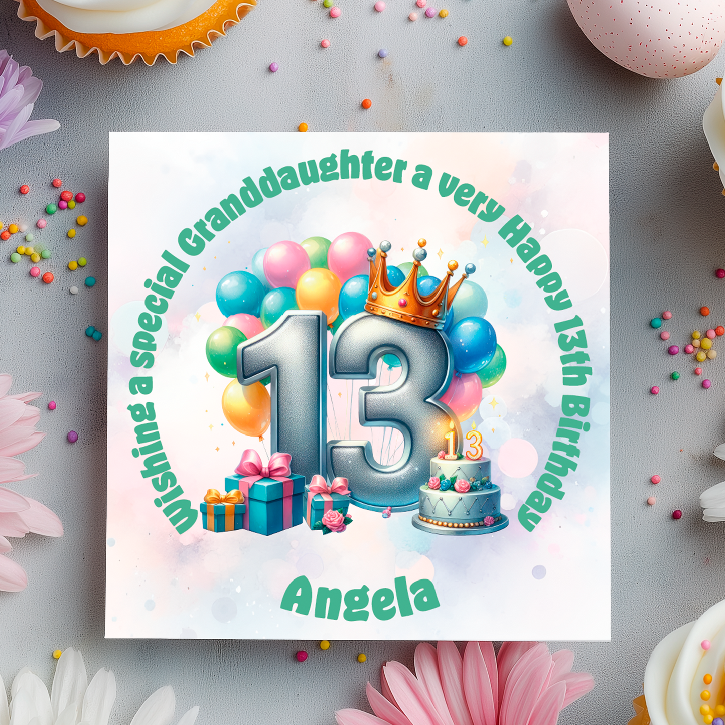 Birthday card with colorful balloons, number 13, and birthday cake on a decorative background.